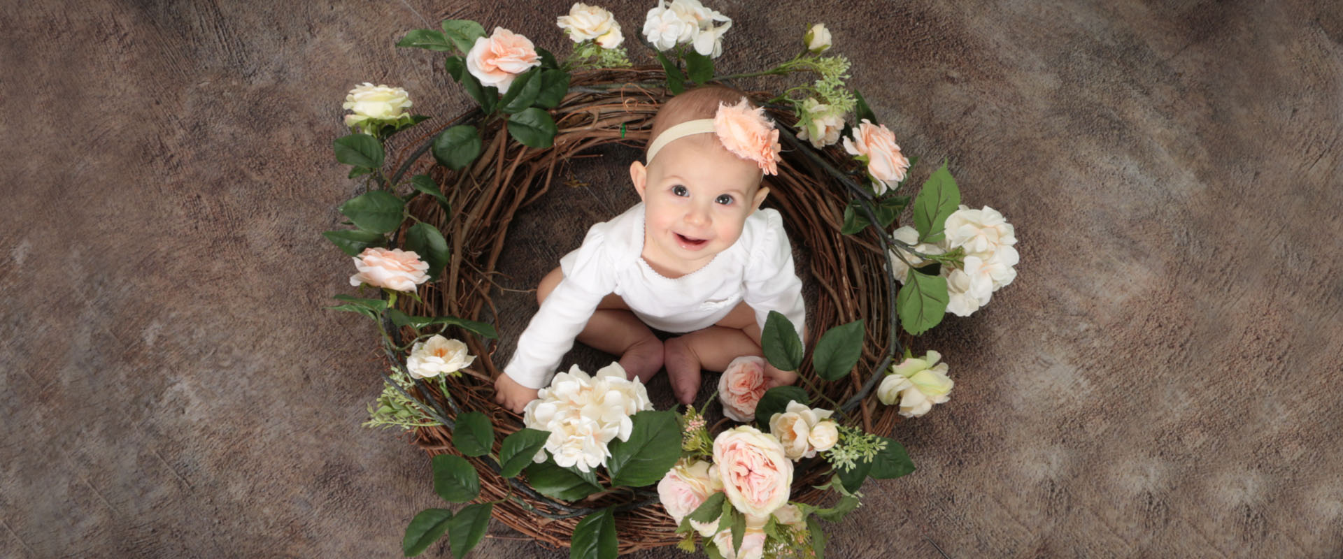 Baby girl Spring portrait with flower garland