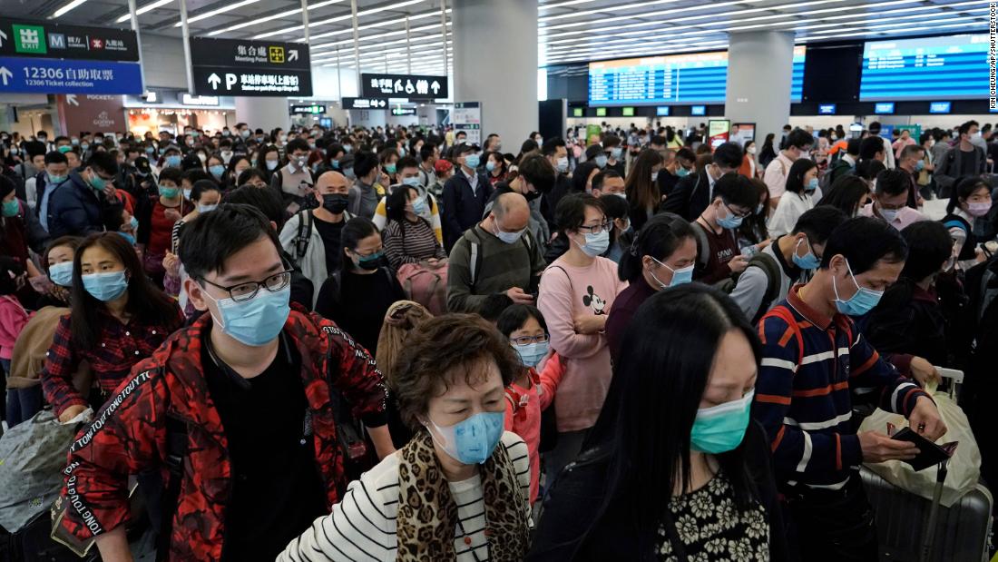 Passengers wear masks at the high-speed train station in Hong Kong on January 23.