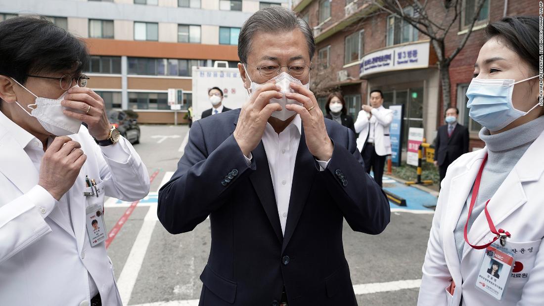 South Korean President Moon Jae-in wears a mask to inspect the National Medical Center in Seoul on January 28.