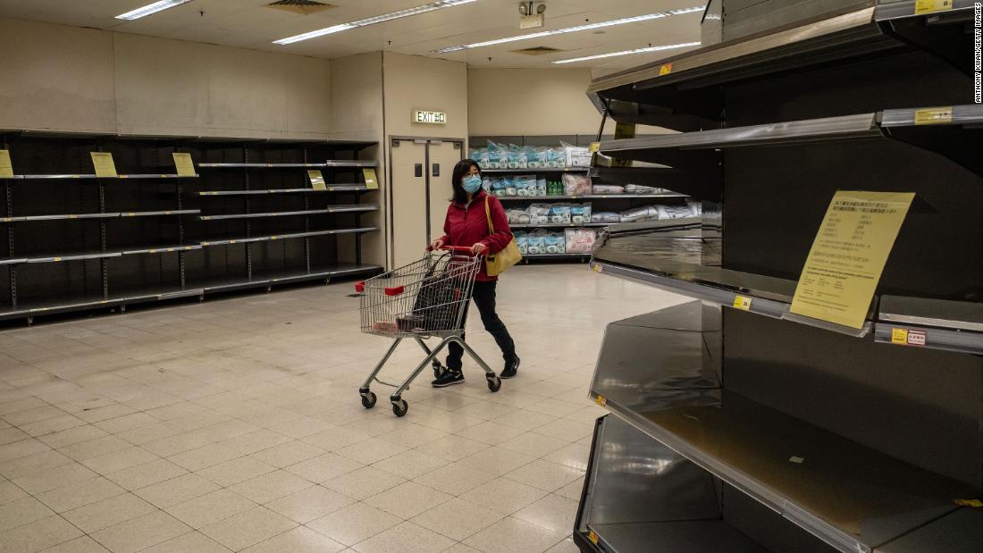 A shopper walks past empty shelves at a grocery store in Hong Kong on February 9. China&#39;s Ministry of Commerce &lt;a href=&quot;https://www.cnn.com/2020/02/06/asia/wuhan-coronavirus-update-intl-hnk/index.html&quot; target=&quot;_blank&quot;&gt;encouraged supermarkets and grocery stores&lt;/a&gt; to resume operations as the country&#39;s voluntary or mandatory quarantines began to take an economic toll. 