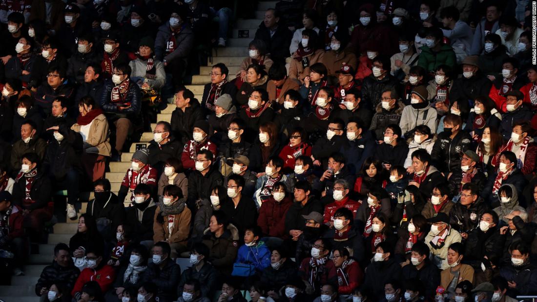 People attend a professional soccer match in Kobe, Japan, on February 23. To help stop the spread of the novel coronavirus, the soccer club Vissel Kobe &lt;a href=&quot;https://www.espn.com/soccer/vissel-kobe/story/4057914/iniestas-vissel-kobe-ban-singing-chanting-due-to-coronavirus-threat&quot; target=&quot;_blank&quot;&gt;told fans not to sing, chant or wave flags&lt;/a&gt; in the season opener against Yokohama FC.
