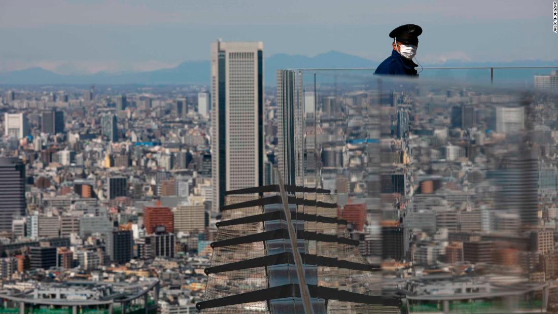 A security guard stands on the Shibuya Sky observation deck in Tokyo on March 3.