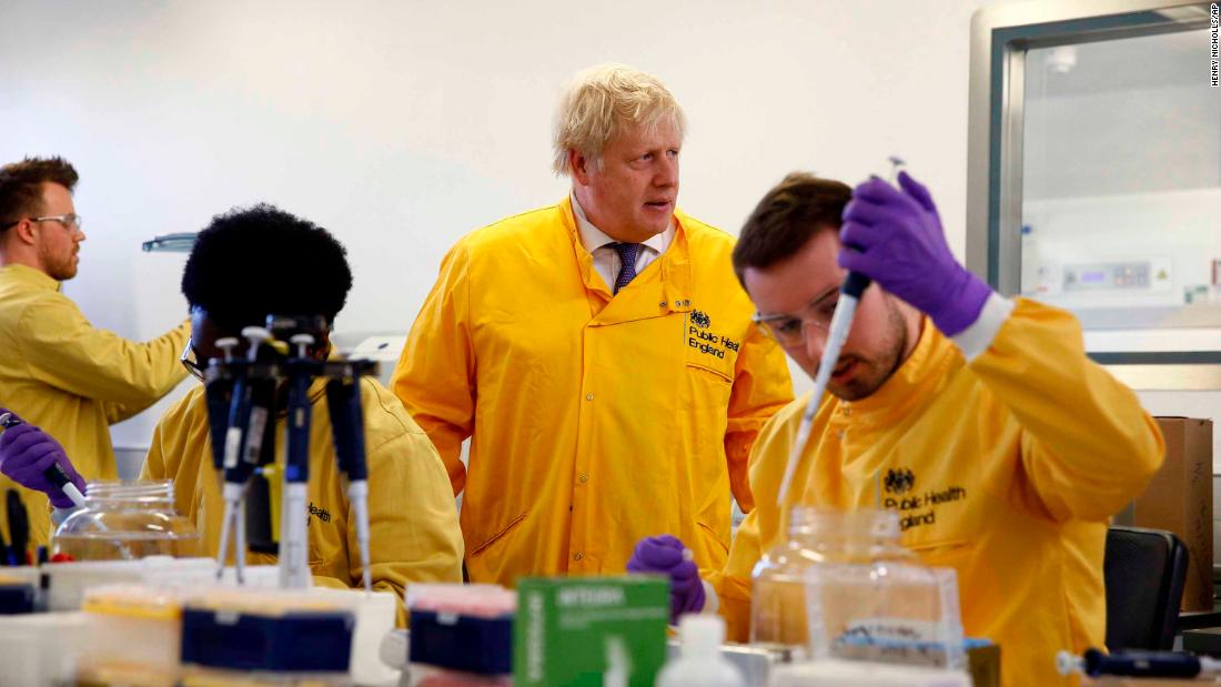 British Prime Minister Boris Johnson visits a London laboratory of the Public Health England National Infection Service.
