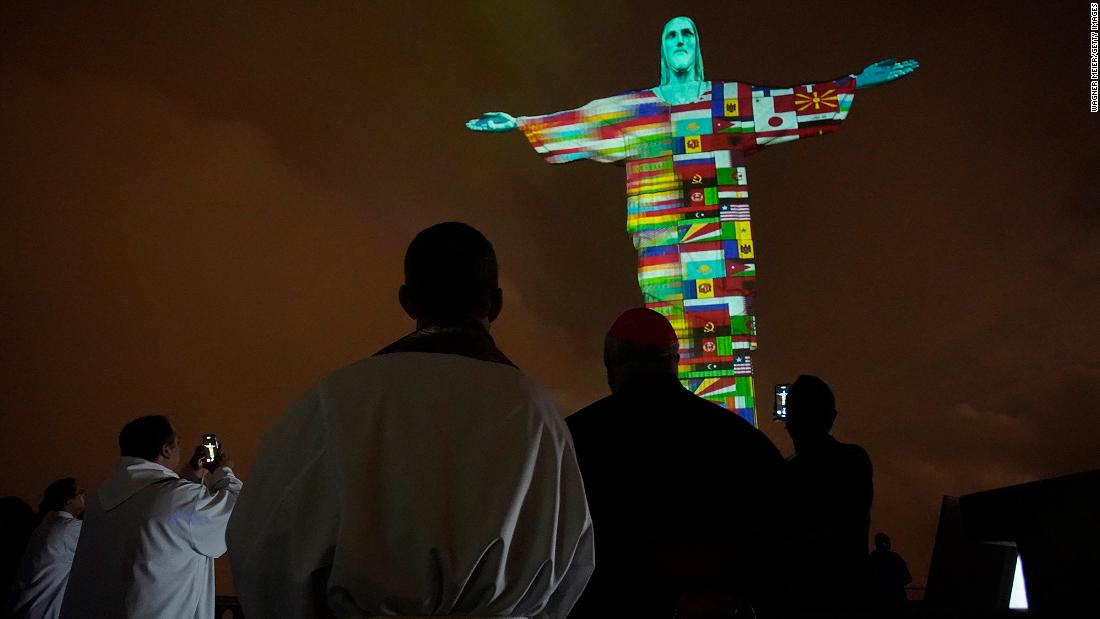 A Mass in Rio de Janeiro honors coronavirus victims around the world on March 18. Brazil&#39;s Christ the Redeemer statue &lt;a href=&quot;https://www.cnn.com/travel/article/coronavirus-rio-christ-the-redeemer-trnd/index.html&quot; target=&quot;_blank&quot;&gt;was lit up with flags and messages of hope&lt;/a&gt; in solidarity with countries affected by the pandemic.