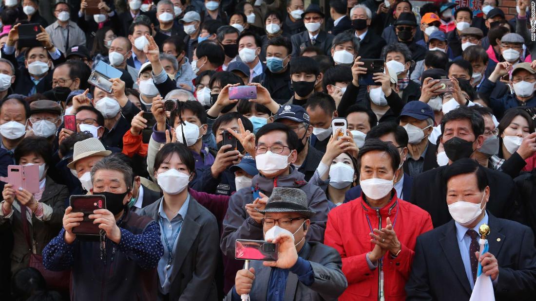 People in Seoul, South Korea, listen to a speech from Hwang Kyo-ahn, who is campaigning for the upcoming &lt;a href=&quot;https://edition.cnn.com/2020/04/13/asia/elections-coronavirus-pandemic-intl-hnk/index.html&quot; target=&quot;_blank&quot;&gt;parliamentary elections.&lt;/a&gt;