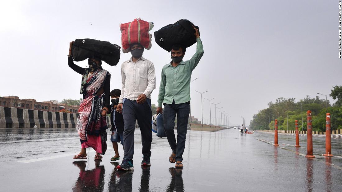 Migrant workers in New Delhi walk toward the Sarai Kale Khan Bus Terminus on May 3 after learning that the government was preparing to send migrant workers back to their home states during the lockdown. In March, Prime Minister Narendra Modi &lt;a href=&quot;http://www.cnn.com/2020/03/30/india/gallery/india-lockdown-migrant-workers/index.html&quot; target=&quot;_blank&quot;&gt;urged all states to seal their borders&lt;/a&gt; to stop the coronavirus from being imported into rural areas.