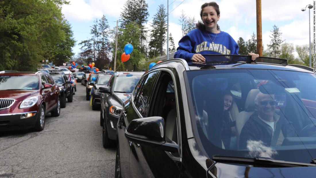 A Briarcliff High School student participates in a parade of graduating seniors through Briarcliff Manor, New York, on May 9.