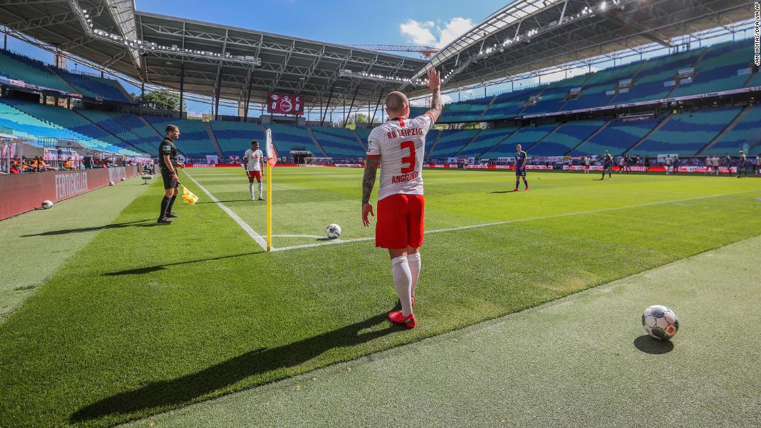 Angelino, a professional soccer player with the German club RB Leipzig, takes a corner kick during a Bundesliga match against Freiburg on May 16. The stadium was nearly empty, as &lt;a href=&quot;https://www.cnn.com/2020/05/15/football/bundesliga-return-soccer-safety-spt-intl/index.html&quot; target=&quot;_blank&quot;&gt;no more than 322 people&lt;/a&gt; are able to attend each Bundesliga match until the end of the season. 
