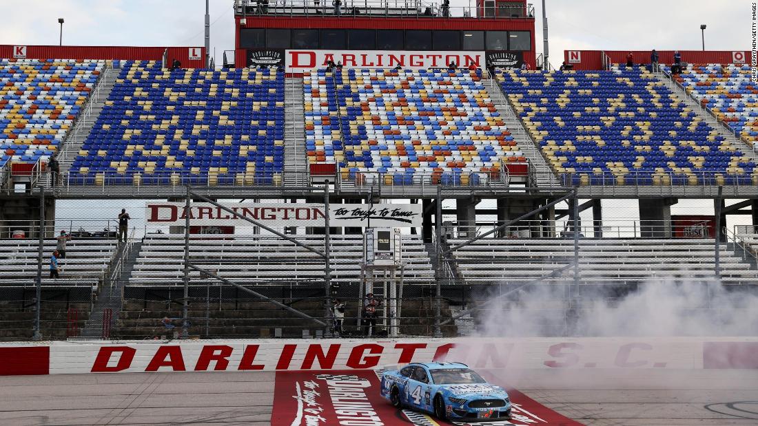 Kevin Harvick celebrates with a burnout after winning a NASCAR Cup Series race in Darlington, South Carolina, on May 17. It was &lt;a href=&quot;https://www.cnn.com/world/live-news/coronavirus-pandemic-05-17-20-intl/h_e8560781fc2629b4a53f4aa0f0623dee&quot; target=&quot;_blank&quot;&gt;NASCAR&#39;s first race&lt;/a&gt; since its season was halted because of the pandemic. No fans were in attendance.