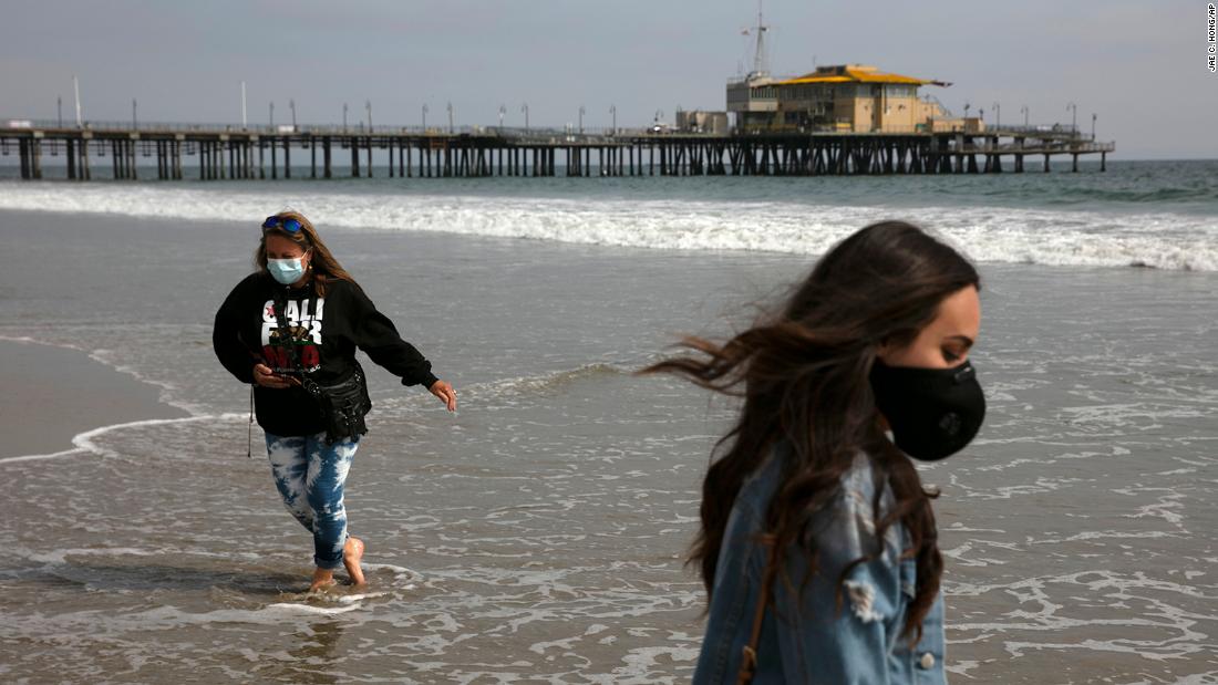 Malia Pena and her mother, Lisa Torriente, wear masks as they visit the beach in Santa Monica, California, on June 23. California was among 25 states &lt;a href=&quot;https://www.cnn.com/2020/06/23/us/us-coronavirus-tuesday/index.html&quot; target=&quot;_blank&quot;&gt;that had recorded higher rates of new cases&lt;/a&gt; compared to the previous week.