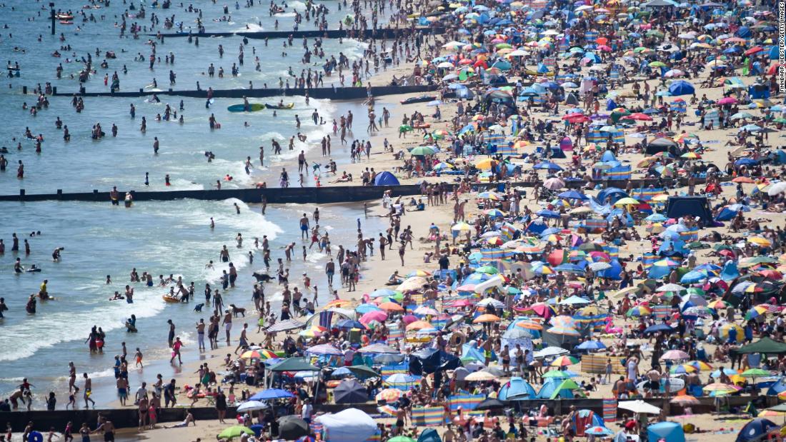 A beach is slammed with people in Bournemouth, England, during a heat wave on June 25. British Prime Minister Boris Johnson &lt;a href=&quot;https://www.cnn.com/2020/05/10/uk/uk-coronavirus-lockdown-boris-johnson-gbr-intl/index.html&quot; target=&quot;_blank&quot;&gt;began easing coronavirus restrictions in May,&lt;/a&gt; but people are still supposed to be distancing themselves from one another. After thousands flocked to beaches, officials in southern England &lt;a href=&quot;https://edition.cnn.com/travel/article/bournemouth-major-incident-beaches-scli-intl-gbr/index.html&quot; target=&quot;_blank&quot;&gt;declared a &quot;major incident.&quot;&lt;/a&gt;